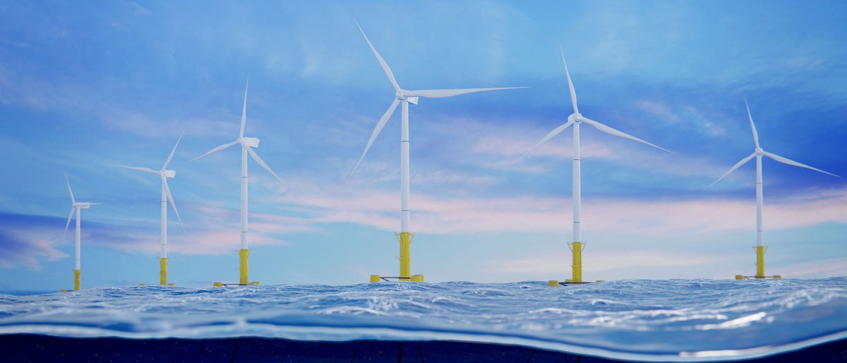 3d rendering of an offshore wind farm with view of submarine cables