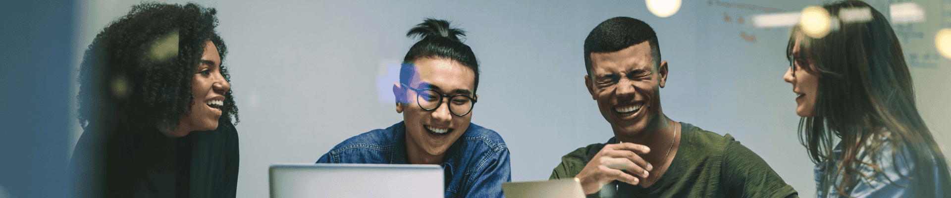 employees talking and collaborating about early careers