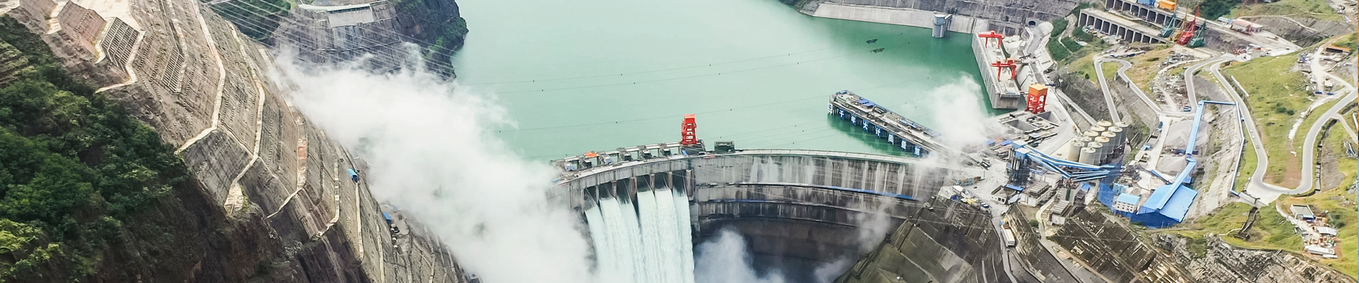 Young woman in an apron in a greenhouse conducts research into the growth of vegetables. Summer assignment for a student