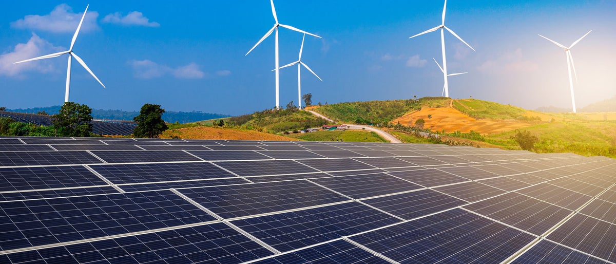 Solar farms and wind power plants  is a renewable energy power plant. Clean energy concept.