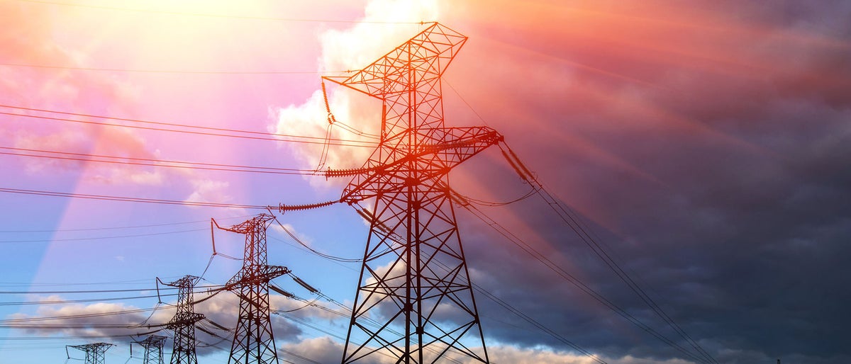 high-voltage  power lines at sunset. electricity distribution station. high voltage electric transmission tower. 