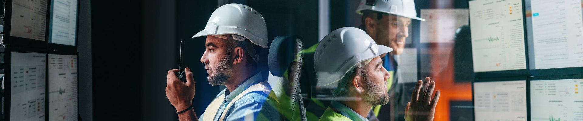 Team of main engineers control of industry process using SCADA system, AI and digital technology. Operators control machine operation processes uses screens. Industry 4.0