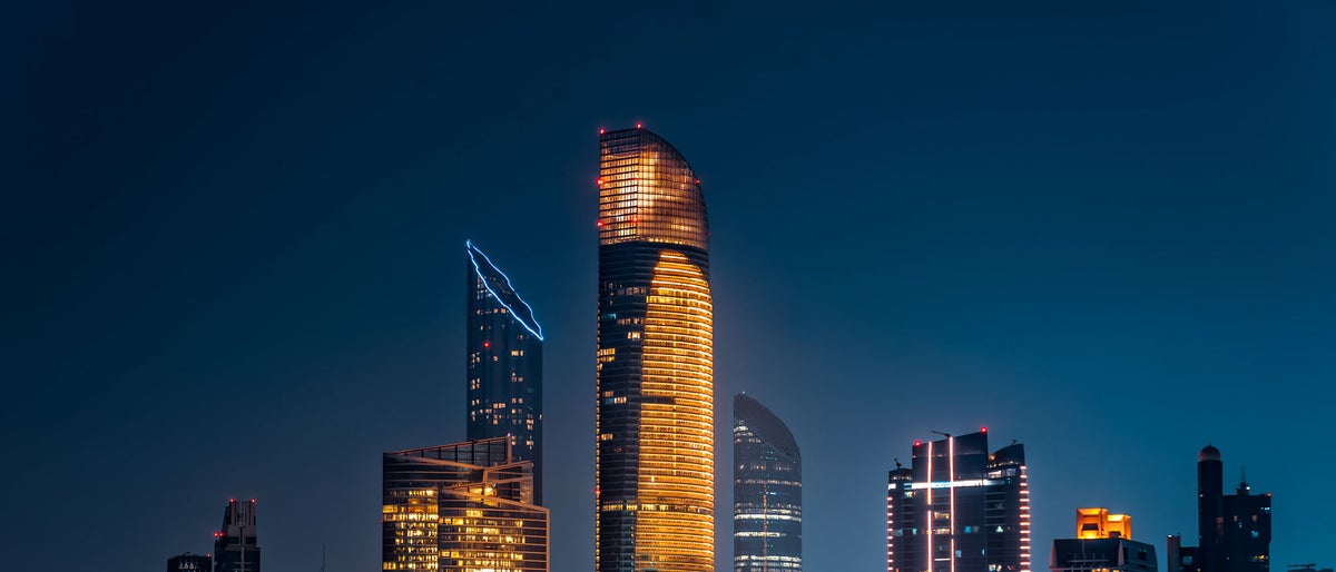 City night view of Abu Dhabi business financial district. United Arab Emirates, middle east. Luxury lifestyle. 