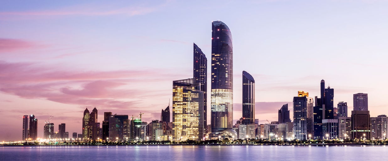 Panoramic view of the Abu Dhabi city skyline at twilight, United Arab Emirates
