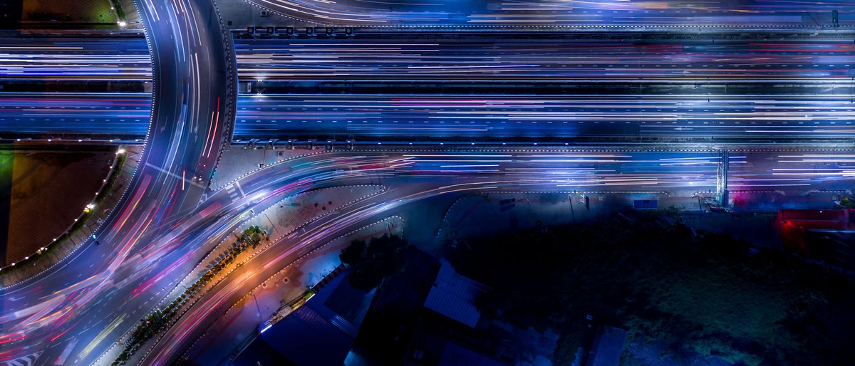 Electron of Traffic circle light tail that show it is a life build of infrastructure road and economic system transportation and communication