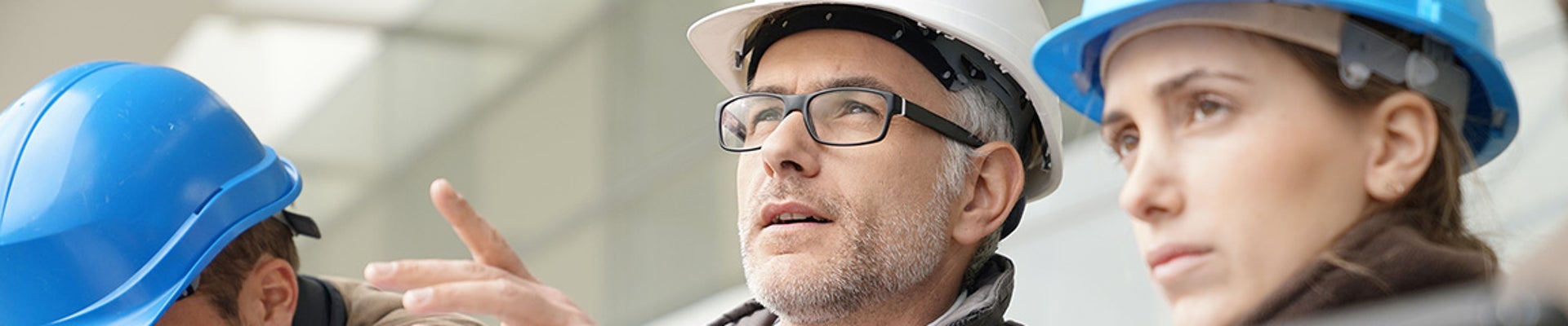 Experienced engineers having discussion during the site visit 