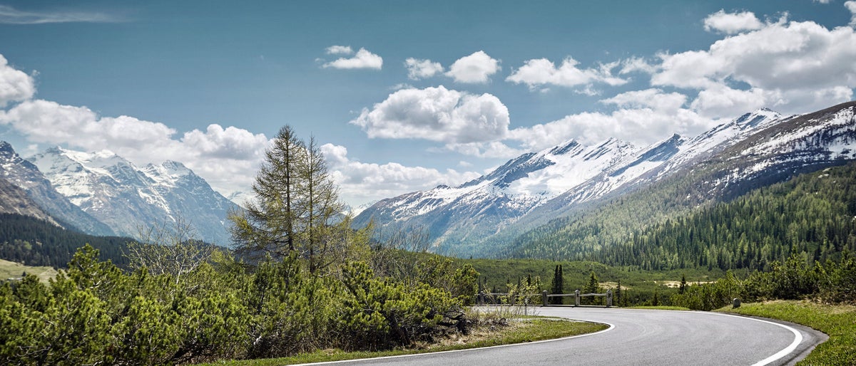 Curved empty road on mountain pass, San Bernardino, Switzerland
