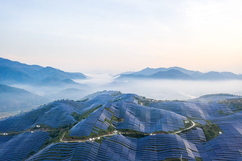 Beautiful mountain solar power station in the morning