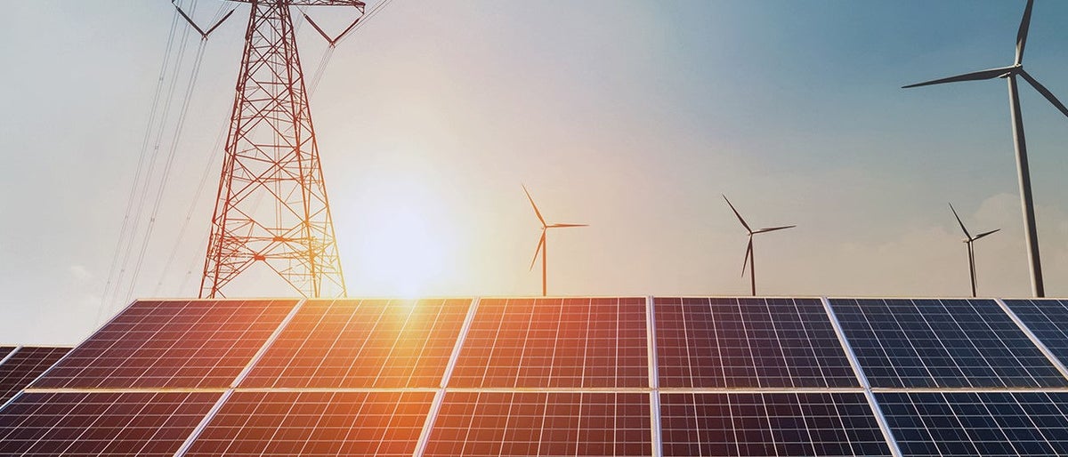 Solar and windmills in sunset
