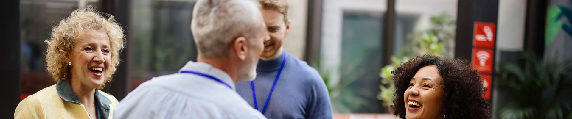 Conference speakers handshaking after presentation at the convention center