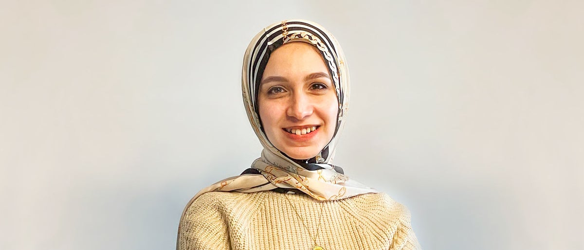 Aya Eleeb smiling while wearing hijab